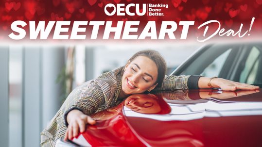 Sweetheart Deal Graphic, showing happy woman hugging car